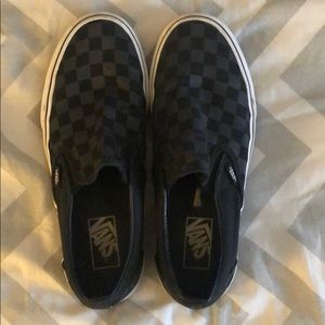 Black checkered slip on vans